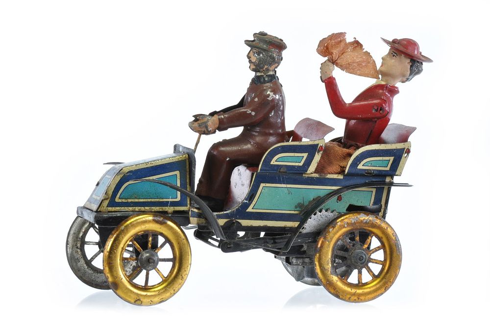 Lot 170: Mechanical Issmayer Tin Car in Nervous Bride Style