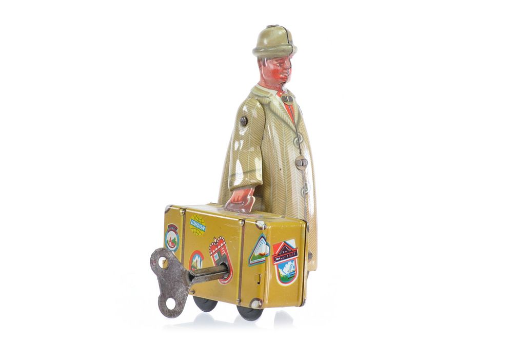 Lot 171: Fritz Voit Traveler with Suitcase German Tin Windup