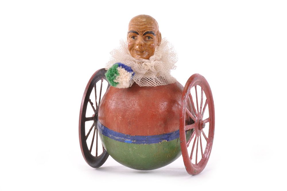 Lot 193: French Rolling Rolly Polly Man on Wheels