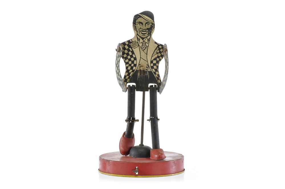 Lot 230: Buffalo Toys No. 106 Jigging and Dancing Tin Minstrel