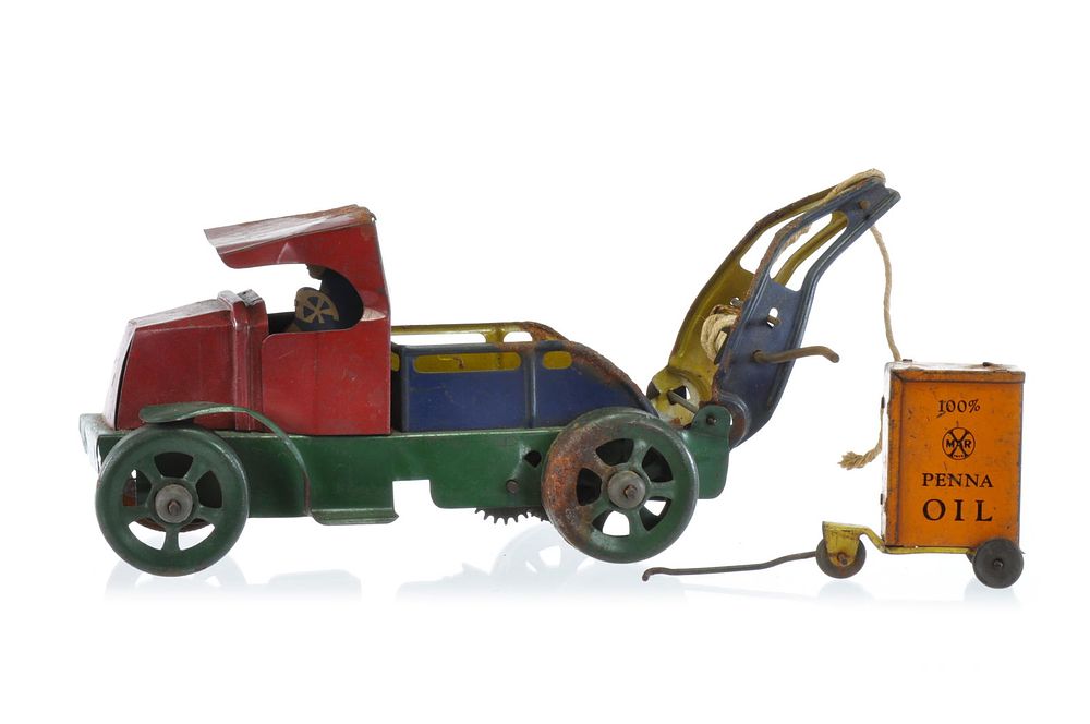Lot 231: Marx Mack Tow Truck and Penna[sylvania] Oil Cart Tin Windup