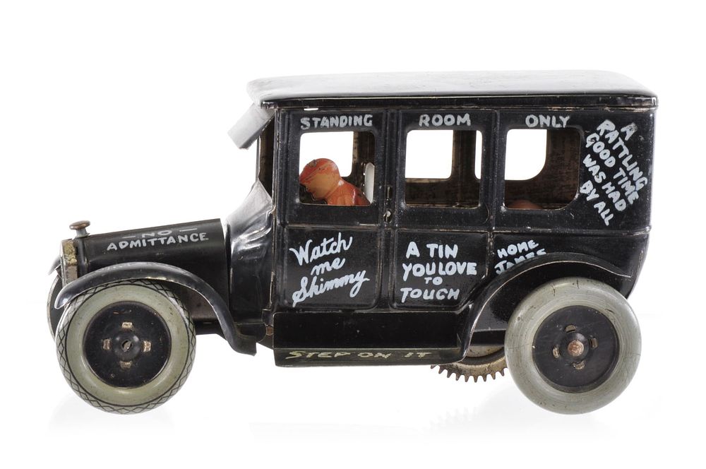Lot 235: Strauss Dizzy Lizzie Tin Windup Car