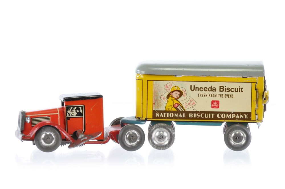 Lot 240: Lindstrom United Biscuit Company Tractor Trailer Tin