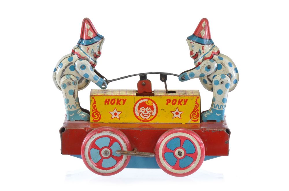 Lot 243: Wyandotte Hokey Pokey Clown Hand Cart Tin Windup