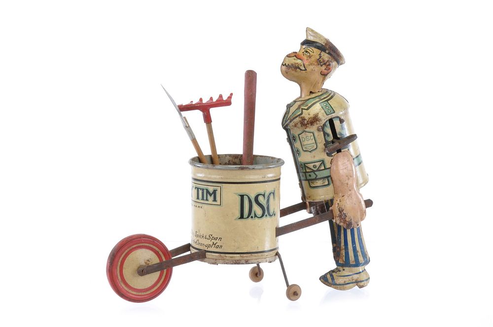 Lot 246: Marx Tidy Tim Tin Cleanup Man Windup Toy