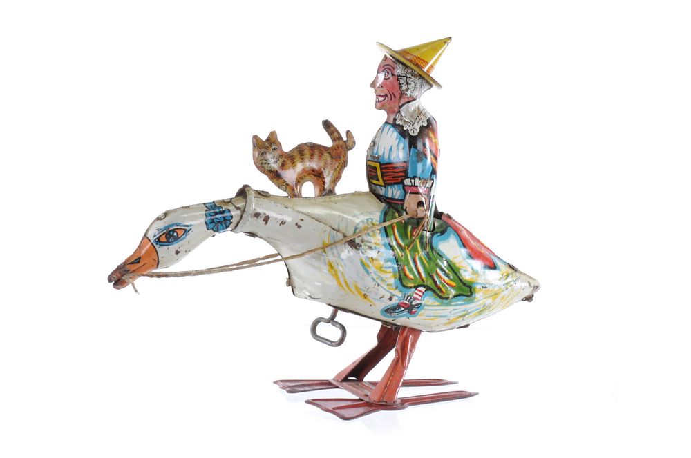 Lot 251: Marx Tin Lithographed Windup Mother Goose with Cat
