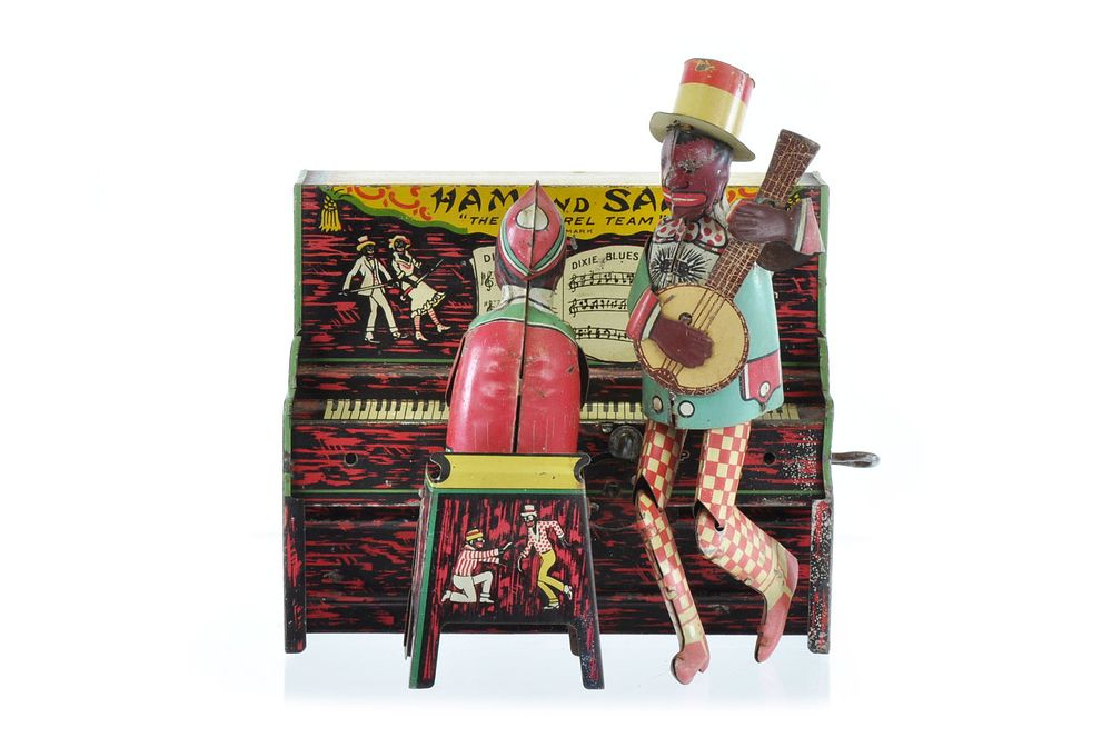 Lot 253: Strauss Mfg. Co. Tin Litho Windup Ham and Sam “The Minstrel Team?? Black Americana Toy