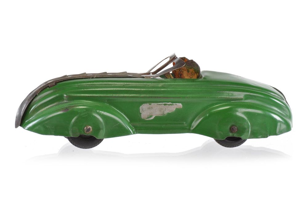 Lot 255: Streamlined Green Race Car with Riders by Wyandotte