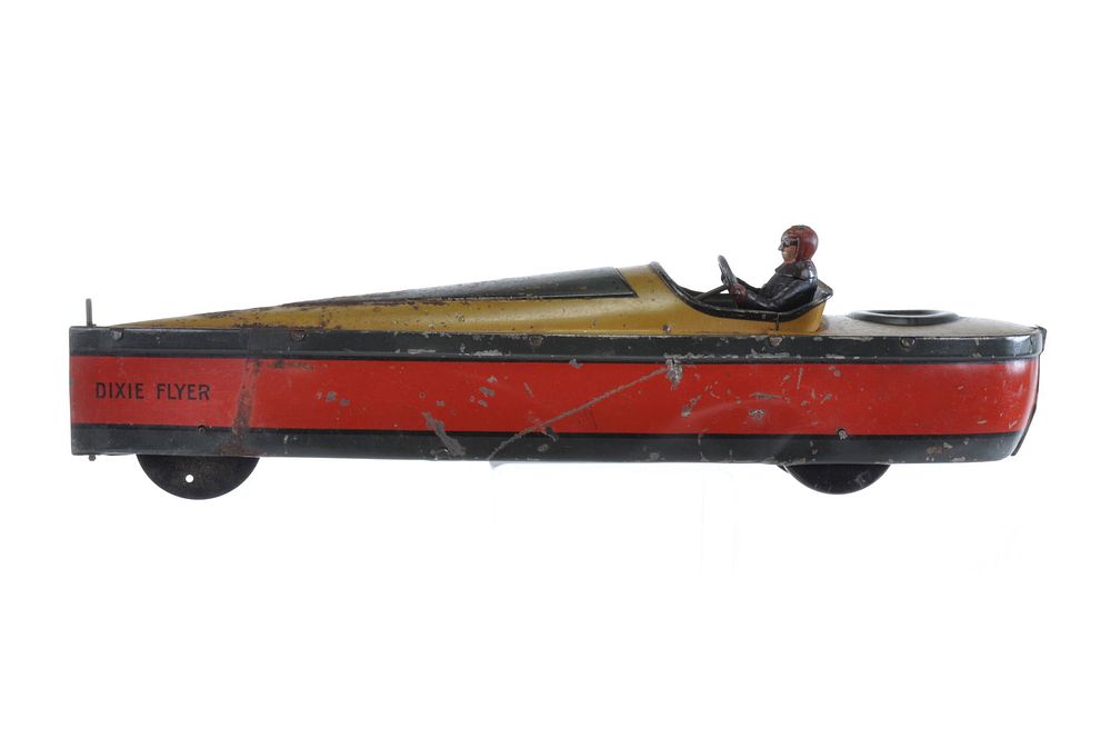 Lot 305: Sleek Hess Number 7 Race Boat with Tin Driver
