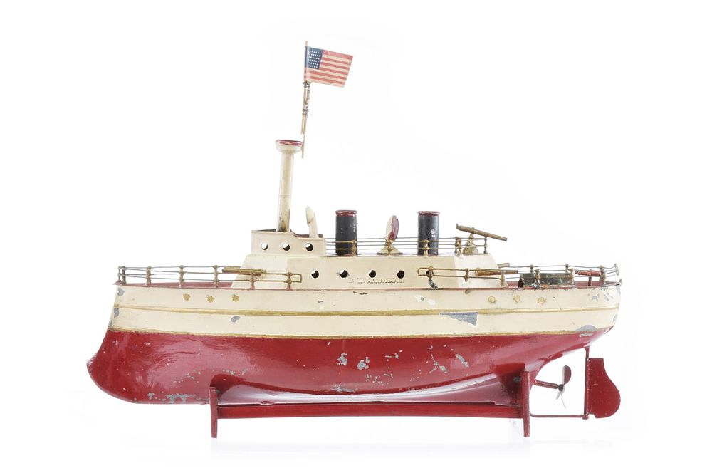 Lot 308: Early Carette River Gunboat Tin Windup