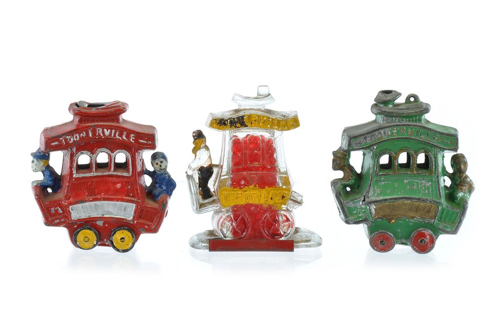 Lot 317: Fontaine Fox Toonerville Trolleys Dent Hardware Slush Mold Lead & Glass Candy Container Lot of 3