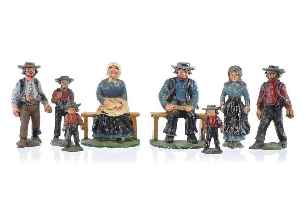 Lot 326: Wilton Cast Iron Amish People Two Bookends and Six Various Sized Figures