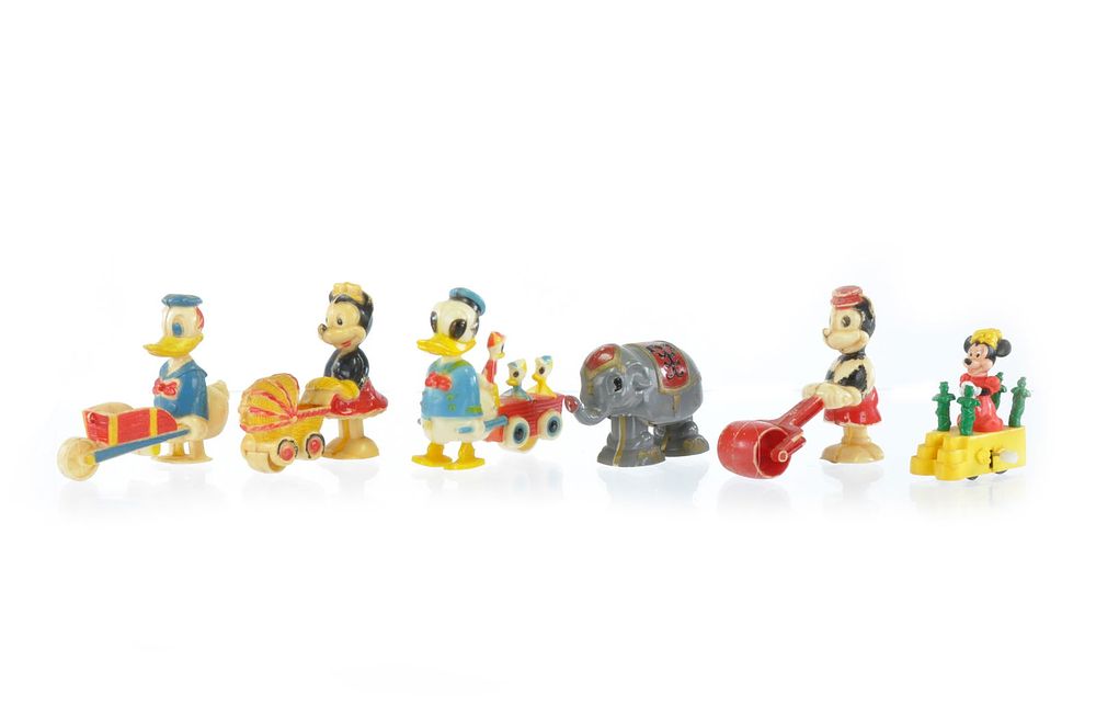 Lot 343: Vintage Walt Disney Character Pull and Windup Toys Mickey, Minnie, Dumbo, and Donald