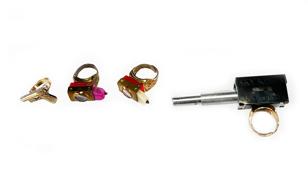 Lot 353: Peter Pan Peanut Butter Sky-King Tele-Blinker, Cracker Jack Premium Prize Rings & More