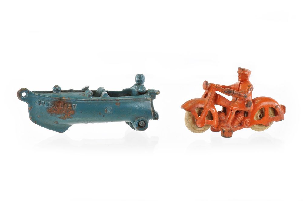 Lot 358: Hubley Cast Iron Speed Boat and Orange Motorcycle