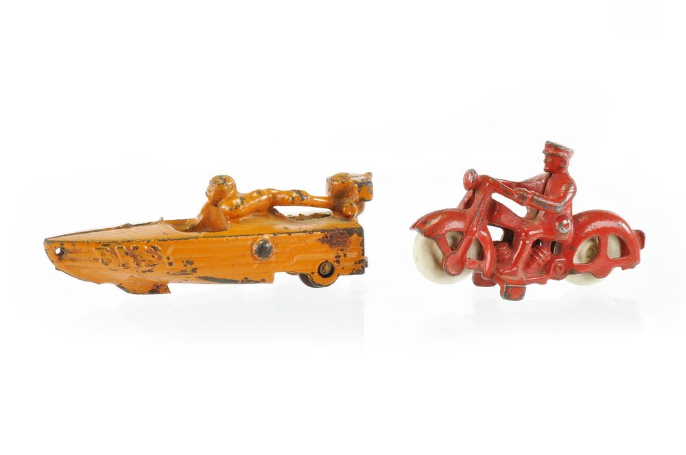 Lot 359: Baby Speedboat By Hubley and Red Motorcycle Cast Iron