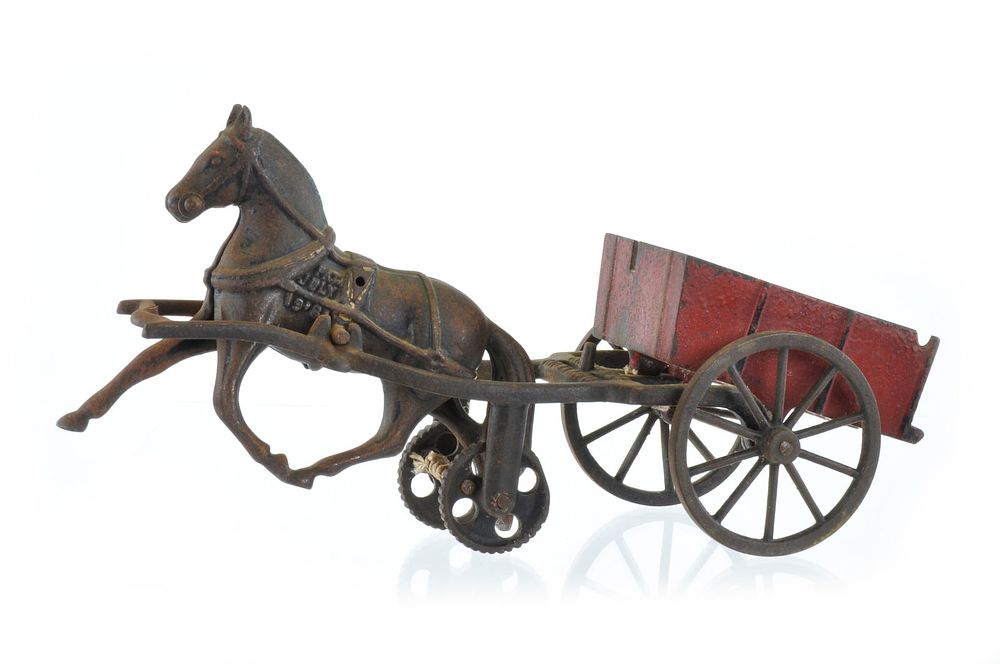 Lot 372: Carpenter Dump Truck with Removable Horse Cast Iron