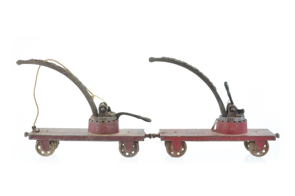 Lot 416E: Two Arcade Toys Train Cranes in Cast Iron