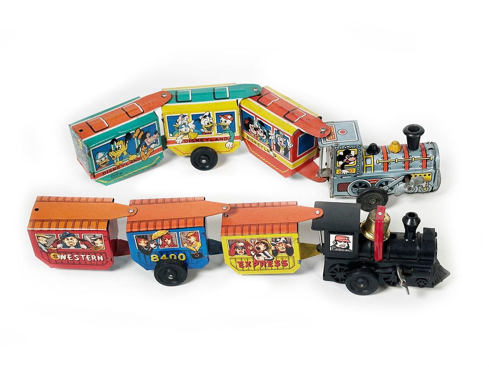 Lot 419: Windup Disney and Cowboy Tin Train Lot by T.T.