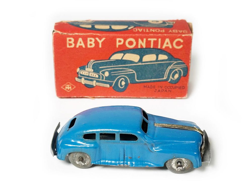 Lot 421: Baby Pontiac Tin Car from Japan