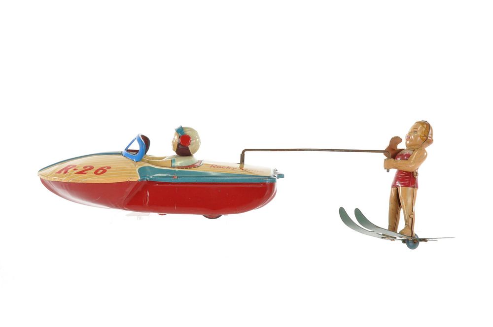 Lot 424: R-26 Rocky Stone Speedboat with Beautiful Lady Skier