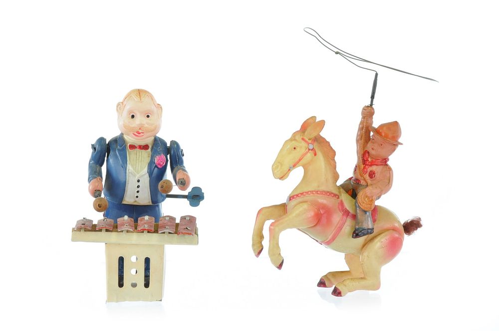 Lot 430: Windup Cowboy and Xylophone Celluloid Set of 2