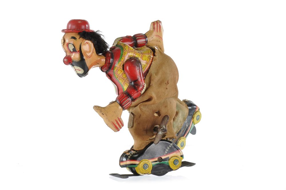 Lot 437: T.P.S. Tin Skating Clown Windup, Japan