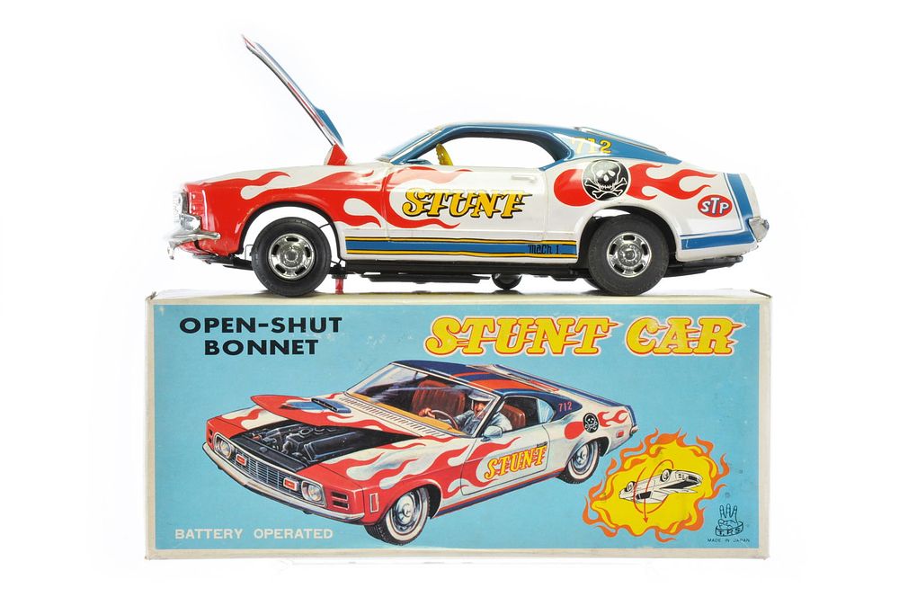 Lot 439: Patriotic Stunt Car Mustang Battery Op. Tin Car Boxed, by T.P.S. Japan