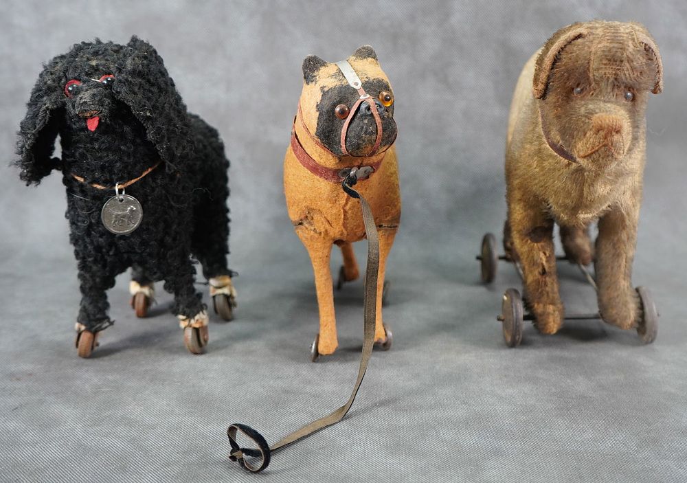 Lot 204J: Group of 3 Antique Dog Pull Toys on Wheels German Bing
