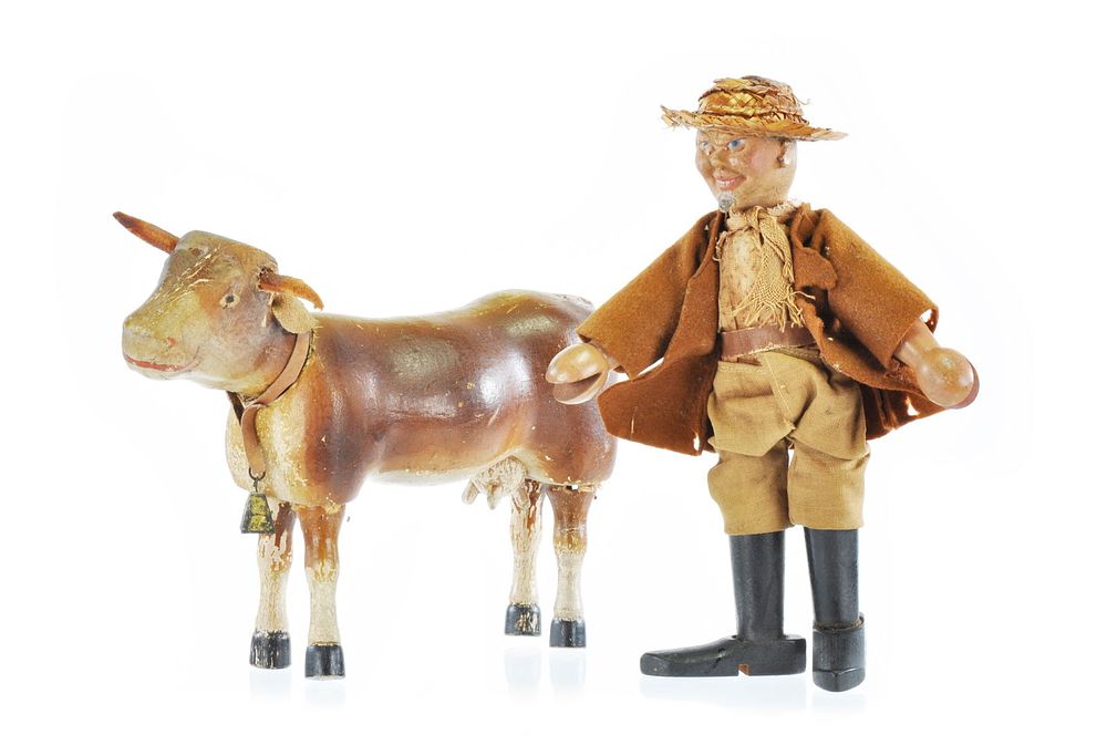 Lot 226: Milk Man and Cow by Schoenhut