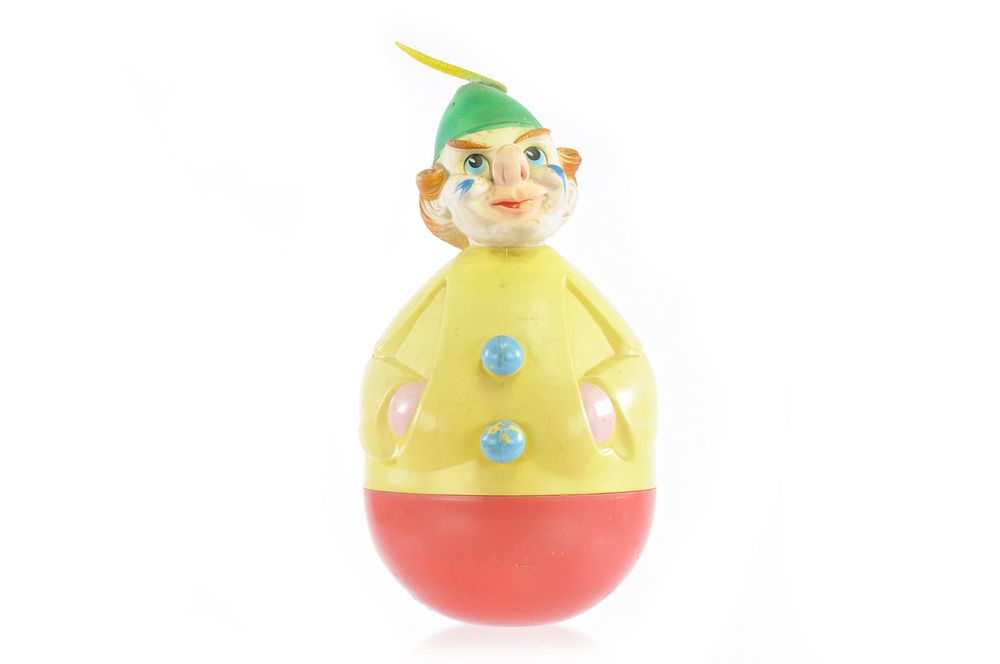 Lot 247: Plastic Rolly Dolly Toy