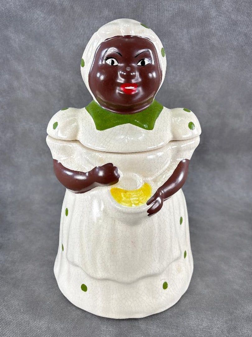 Lot 282: McCoy Pottery Black Cook Mom Mixing Batter Cookie Jar