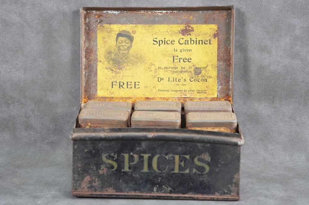 Lot 297: De Lite's Cocoa Tin Spice Cabinet with Inserts Advertising
