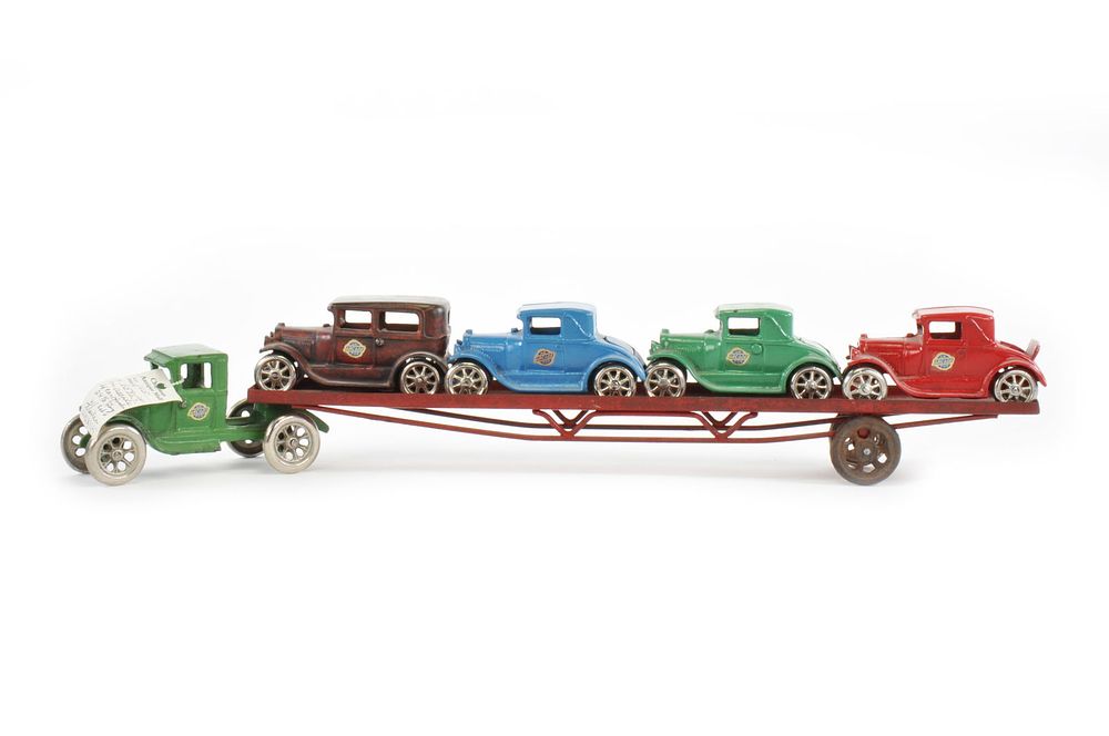 Lot 204: Arcade Toys 4 Car Transport Truck and Cars