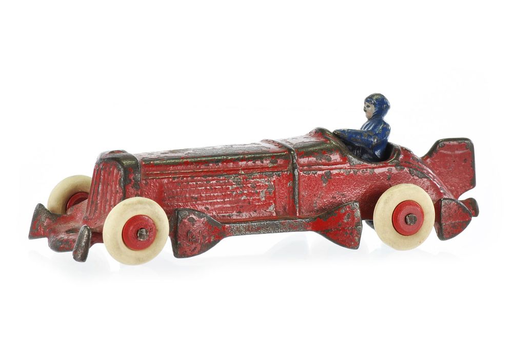 Lot 249: Champion Cast Iron Race Car with Driver