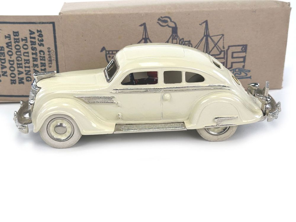 Lot 258: White Chrysler Airflow Cast Iron by Sehloff Products
