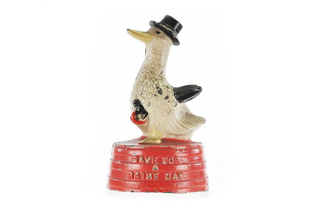 Lot 325: Hubley Save for a Rainy Day Duck on a Tub Still Bank 1930-1936