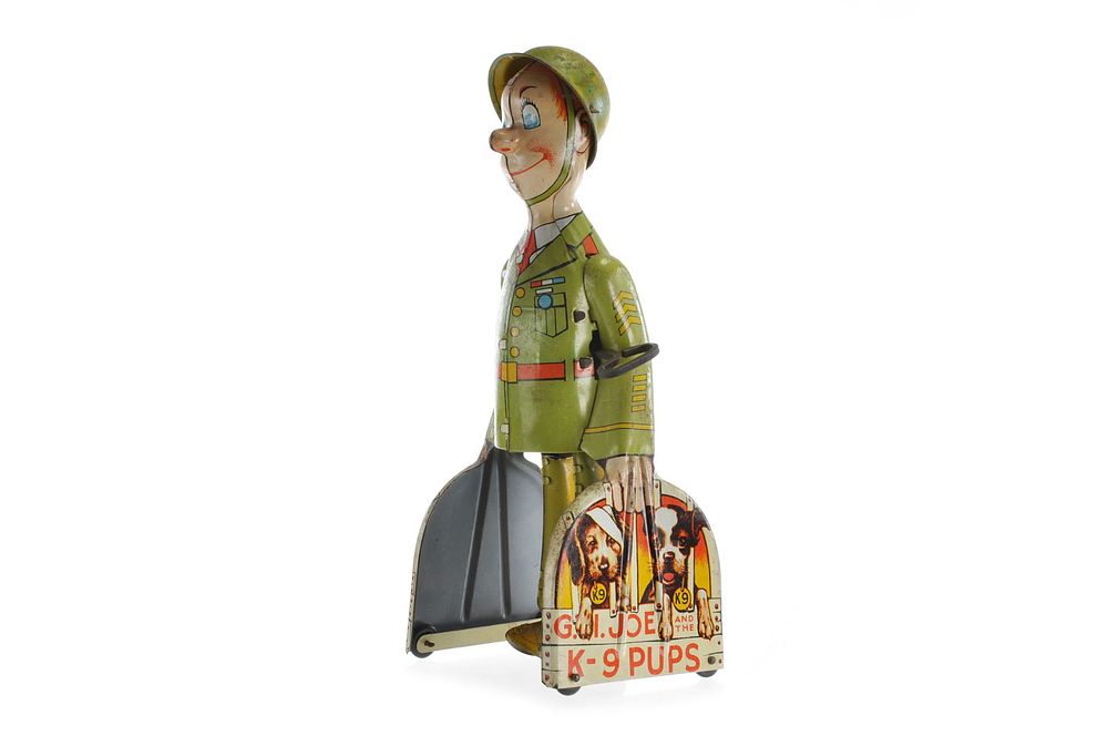 Lot 338: Unique Art Tin Litho Windup G.I. Joe & the K-9 Pups