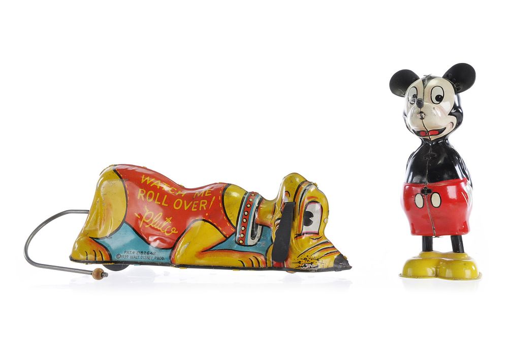 Lot 349: Marx Roll-Over Pluto & Linemar Twirling Tail Mickey Disney Windup Toys