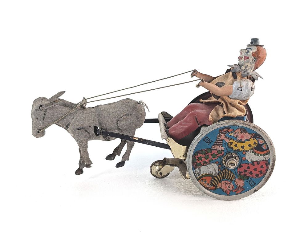 Lot 362: Lehmann Germany Tin Litho Windup Circus Clown & Donkey Pulling Cart