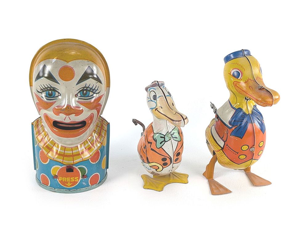 Lot 372: J. Chein Windup Tin Litho 2 Ducks & Tin Litho Clown Bank