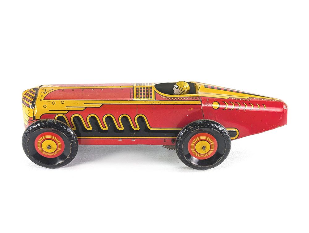 Lot 385: Large Marx Tin Litho Windup Race Car Works