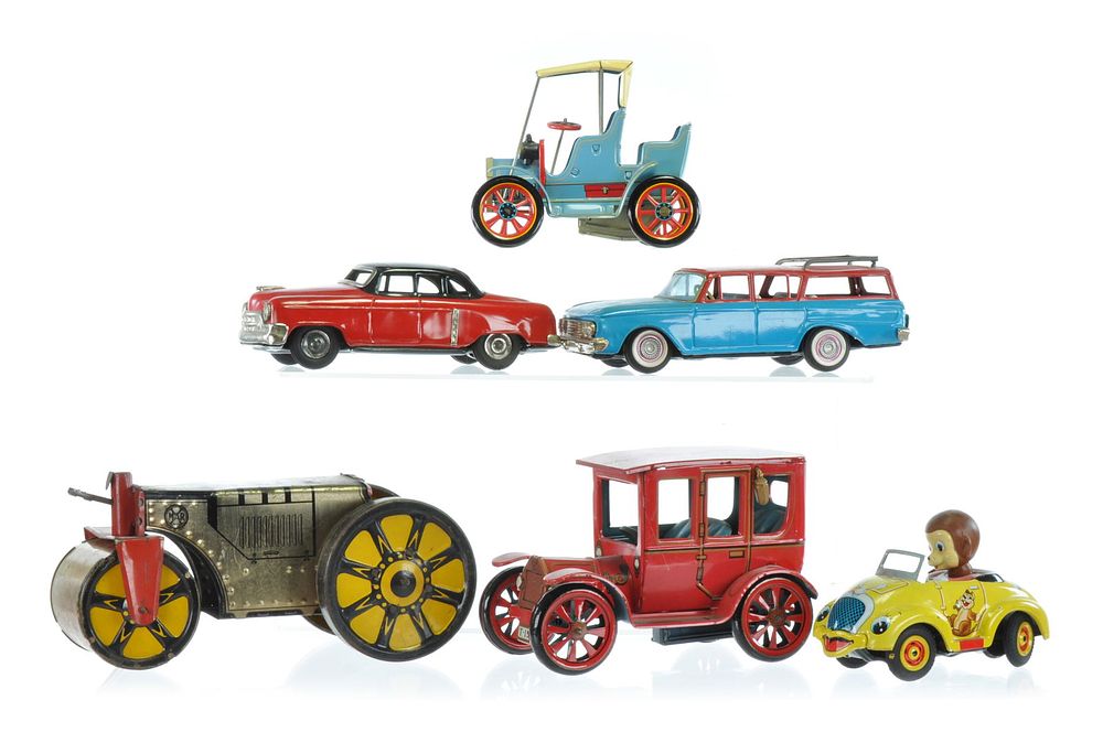 Lot 411: Masudaya Etc. Six Tin Cars and Road Roller Toy Lot
