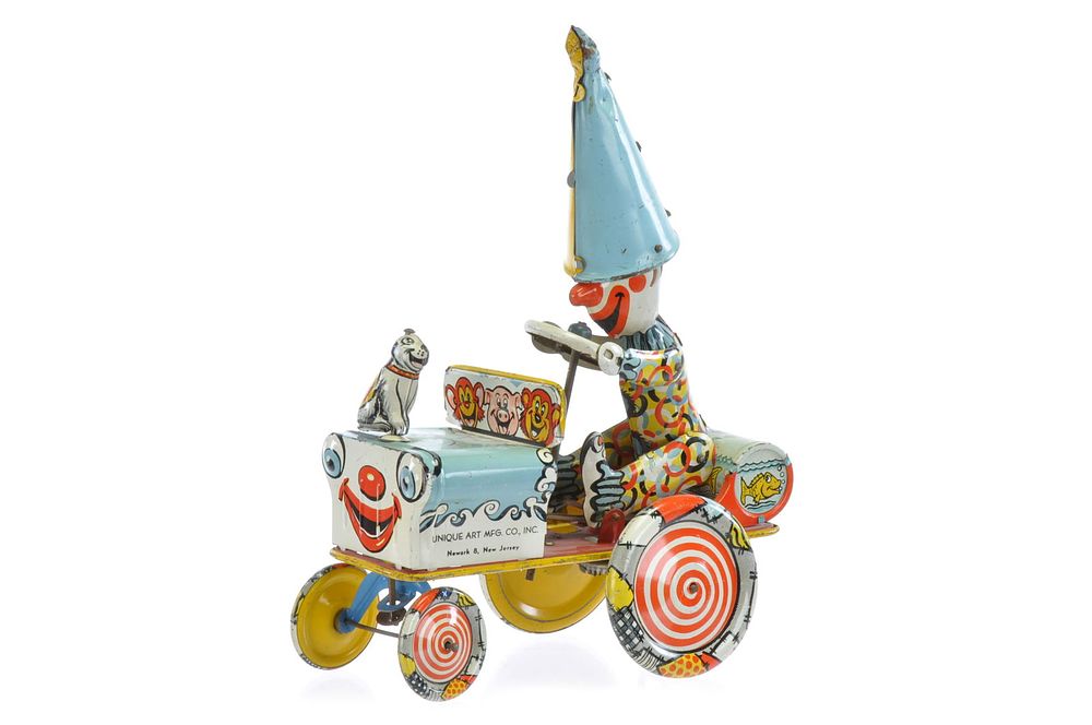 Lot 422: Unique Art Clown Crazy Car Tin Windup