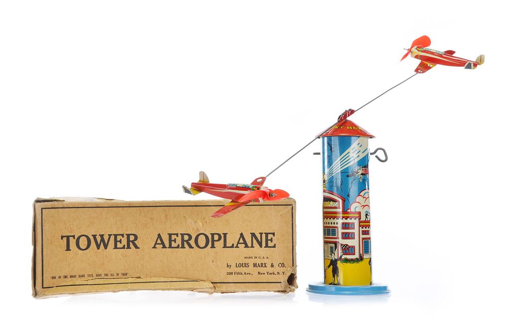 Lot 458: Boxed Marx Tower Airplane Tin Toy