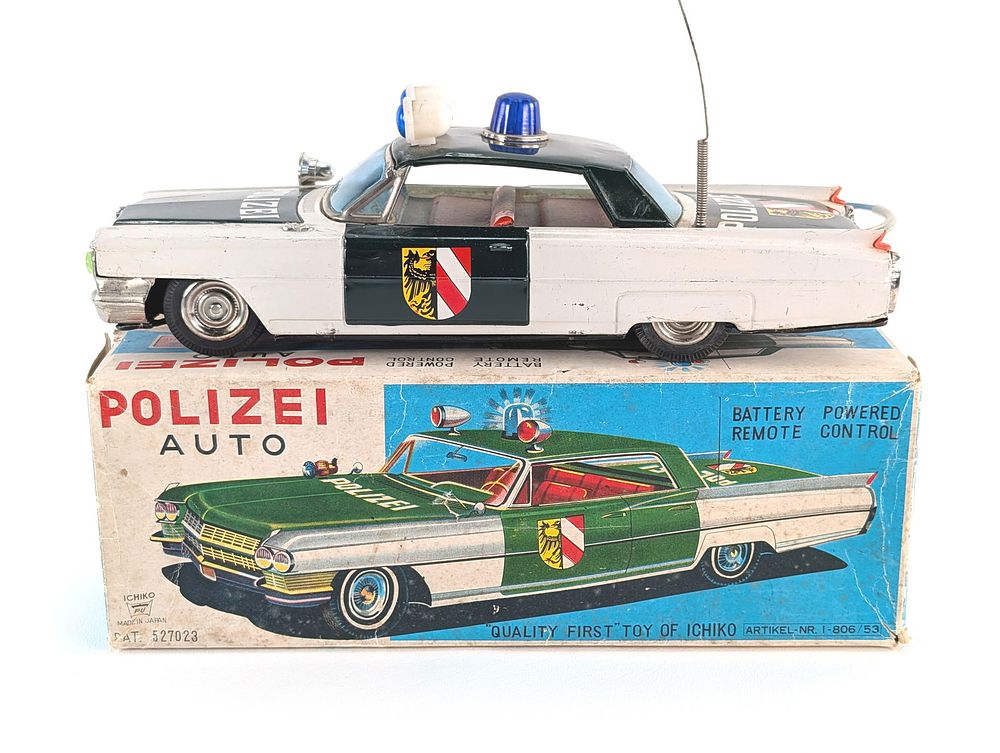 Lot 485: Japanese Batt. Op. Remote Control Tin Litho Police Car Boxed