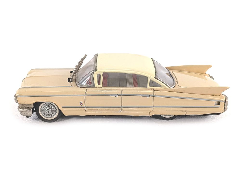 Lot 487: Japanese Yonezawa Tin Litho Friction Cadillac Beige Works