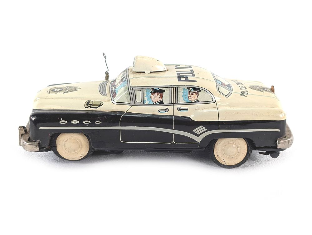 Lot 488: Japanese Buick Tin Litho Police Dept Batt. Op. Friction Car Not Working