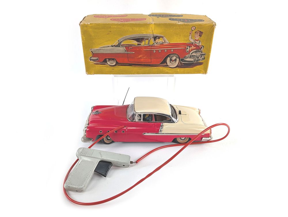 Lot 492: Western Germany SG 850 Tin Litho Batt. Op. Remote Control Cadillac MIB