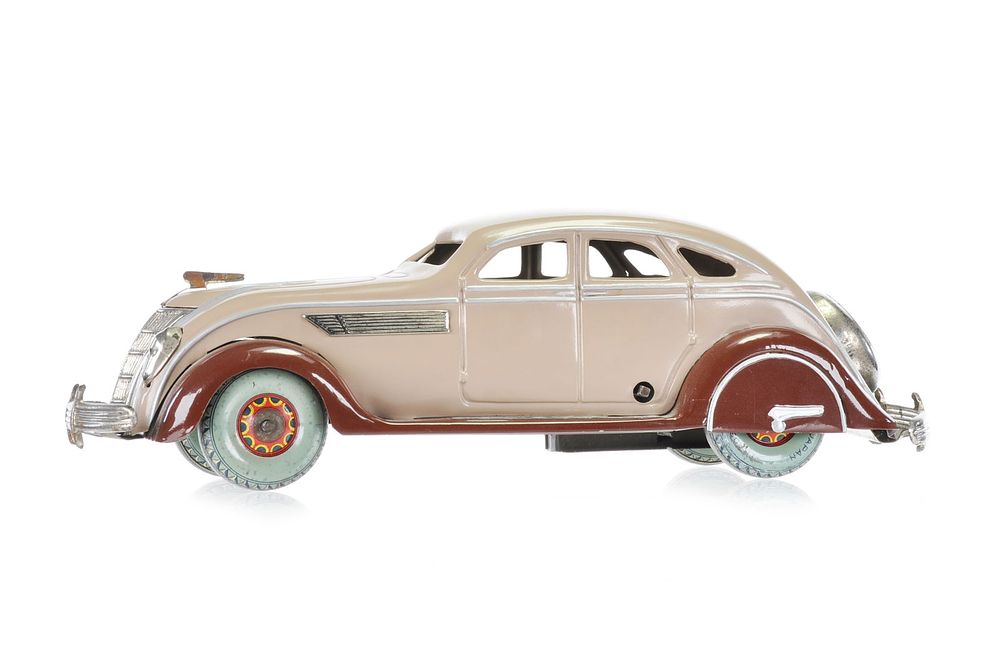Lot 500: 1935 Chrysler Airflow Tin Car in Tan and Brown